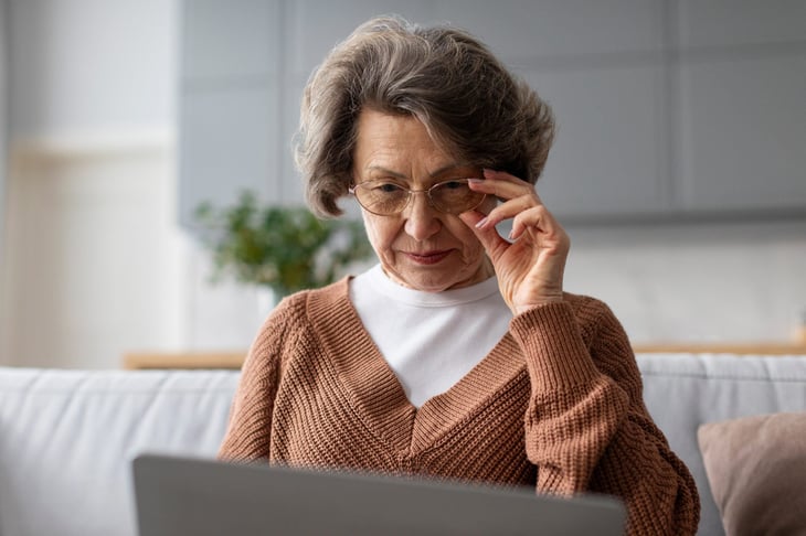 older woman looking at computer